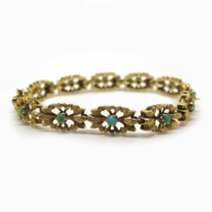 <b>Bracelet ancien</b><br><i> Or jaune et turquoises</i>