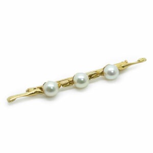 <b> Broche  </b><br><i>Or jaune et perles de culture - De Saedeleer</i>