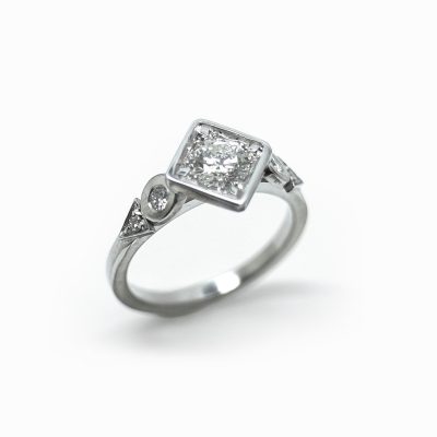 Bague diamants et or blanc volute