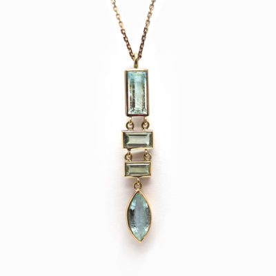 Collier long en or rose et aigues marine